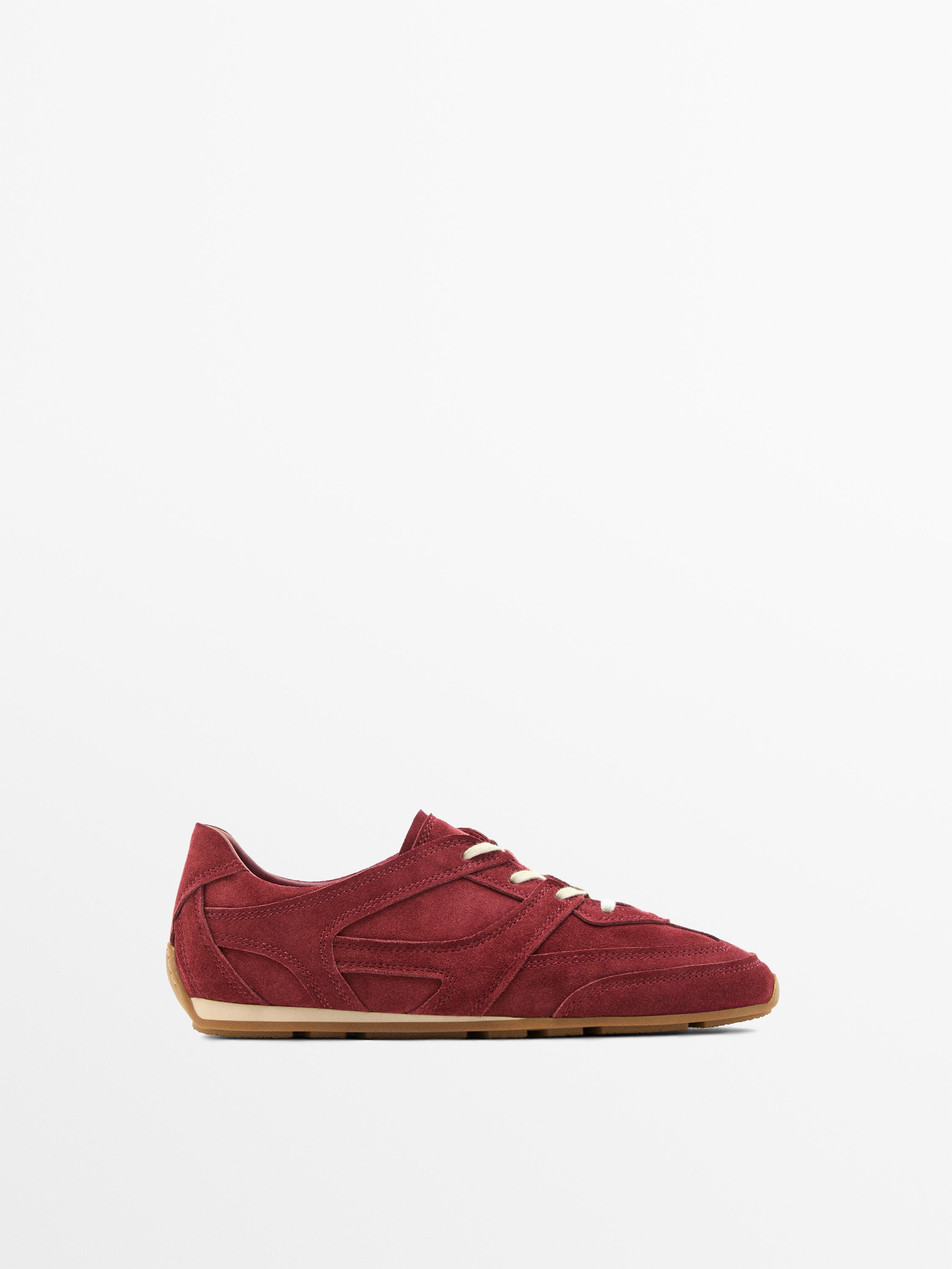 Split leather trainers with piece details